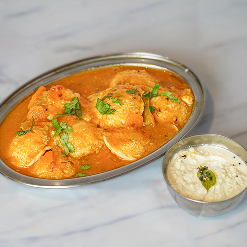 Minighee-idly-dipped-in-sambar